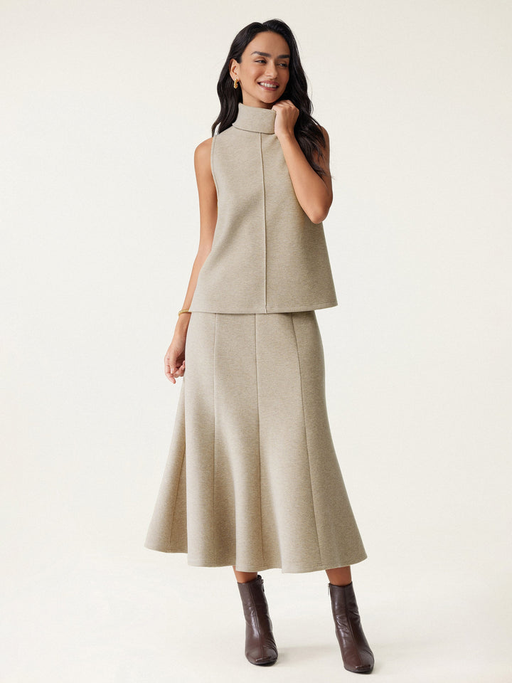 Maison Delcourt ™ | Pull à col roulé avec ourlet fendu