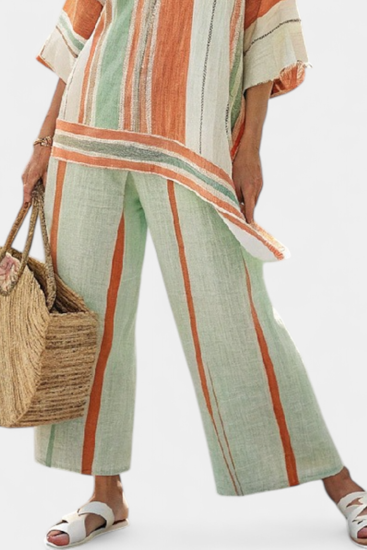 Elisabetta – top asimétrico elegante y pantalones de pierna ancha