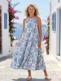 Isadora | Vestido midi sin mangas con cuello alto y volantes